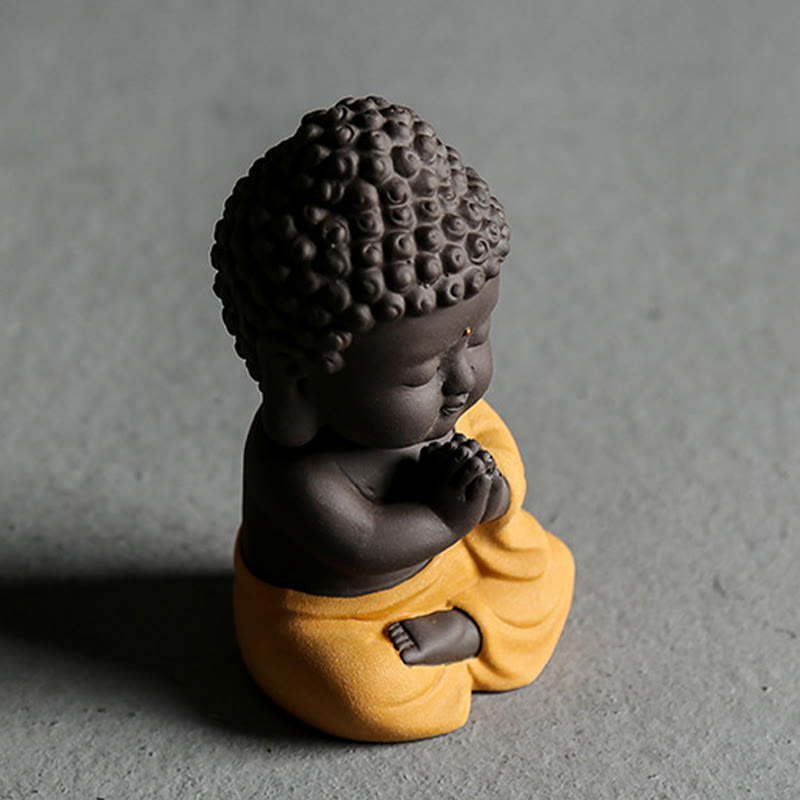 Kleine Buddha-Statue aus violettem Ton für Gelassenheit zu Hause