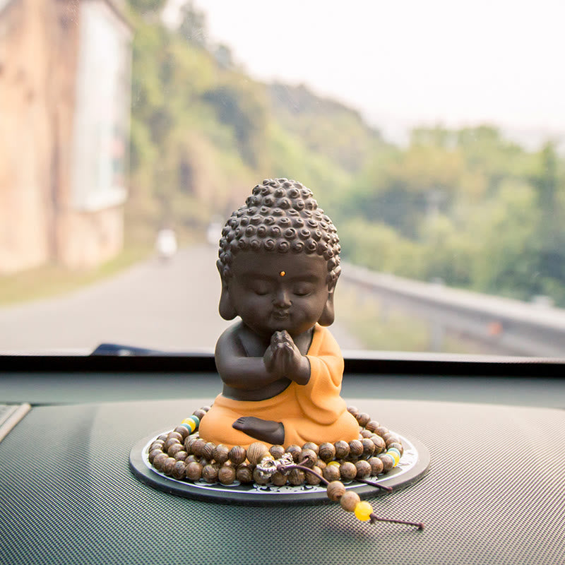 Kleine Buddha-Statue aus violettem Ton für Gelassenheit zu Hause