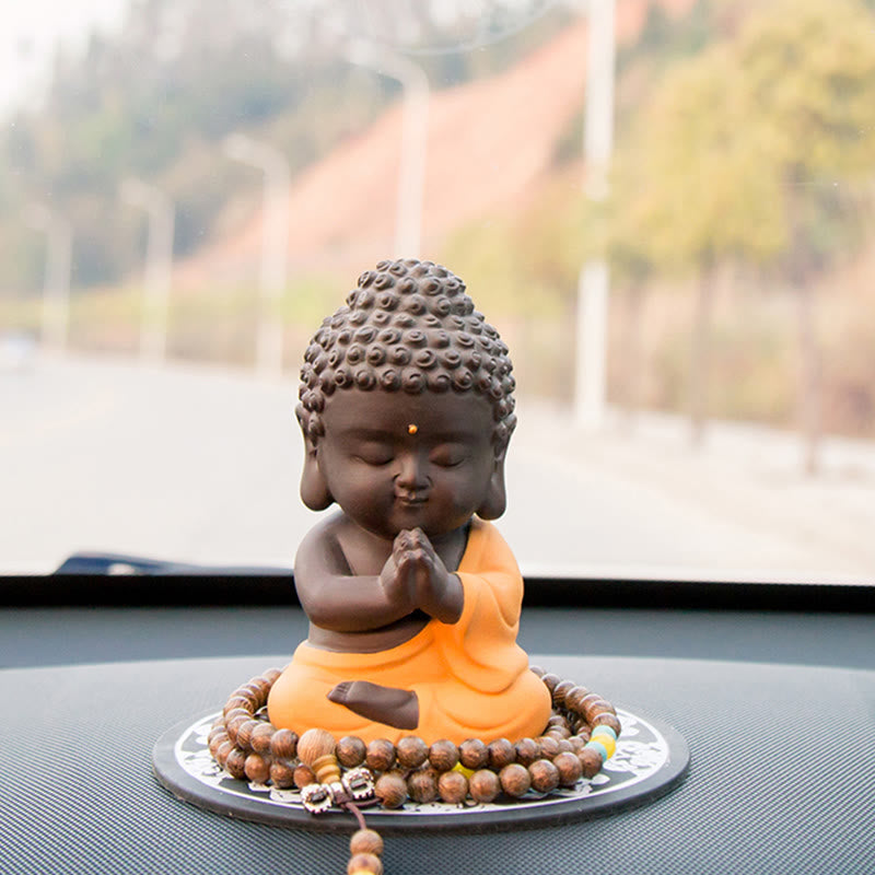 Kleine Buddha-Statue aus violettem Ton für Gelassenheit zu Hause