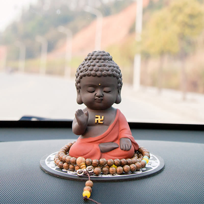 Kleine Buddha-Statue aus violettem Ton für Gelassenheit zu Hause