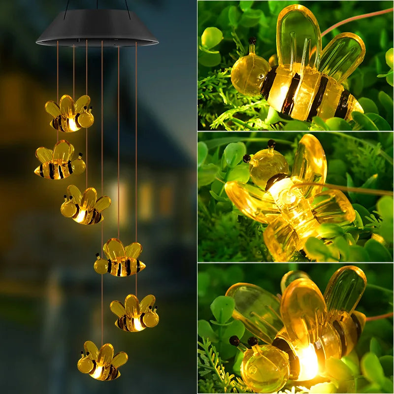 Solar Bee Wind Chime Lamp illuminating honey bees in a vertical outdoor garden display