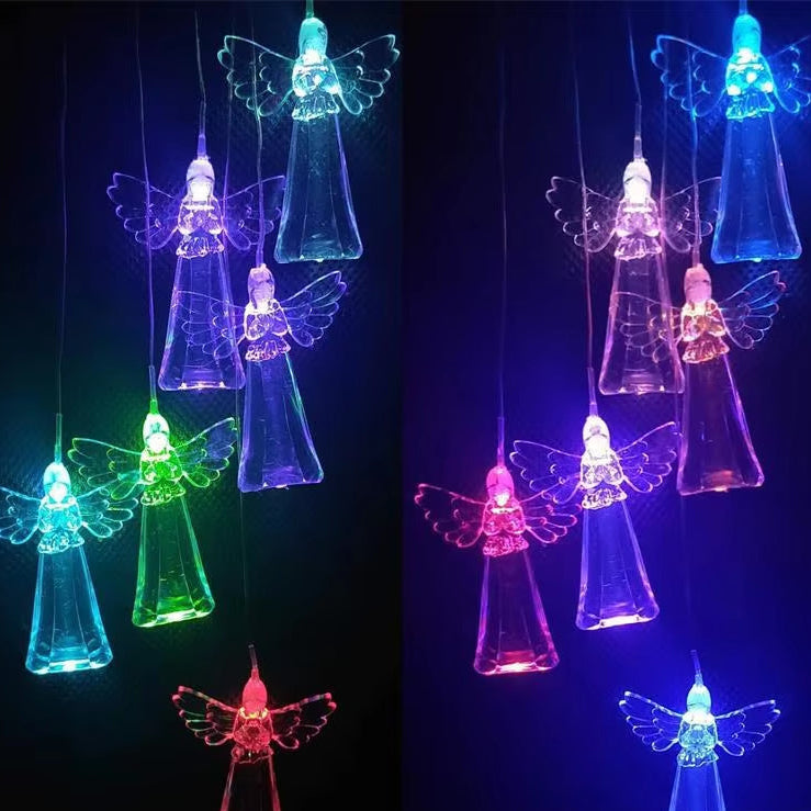 Glowing LED angel decorations with colorful illuminated wings for garden decor