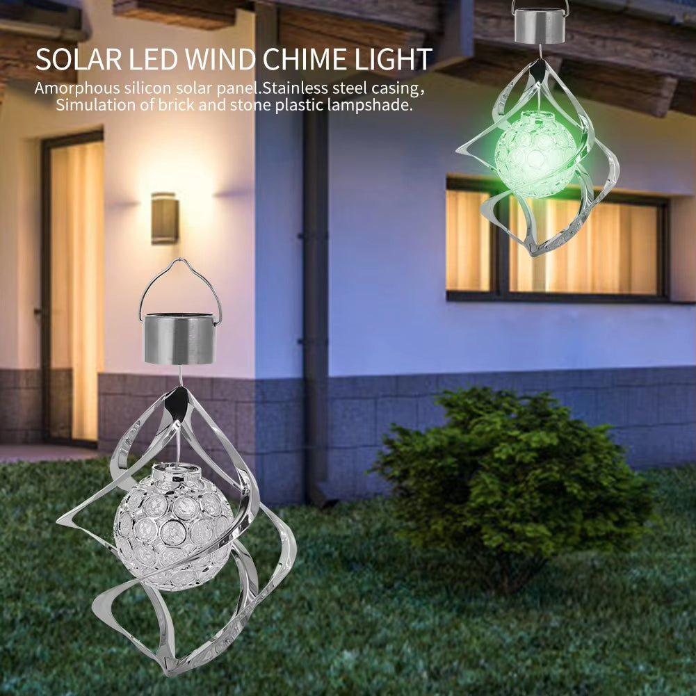 Solar LED Color-Changing Wind Chimes featuring spiral metal design and glowing orb