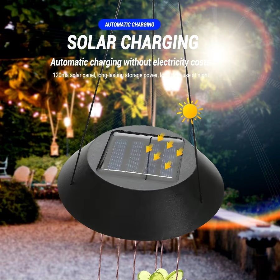 Solar-powered wind chime with black dome top for decorative outdoor lighting