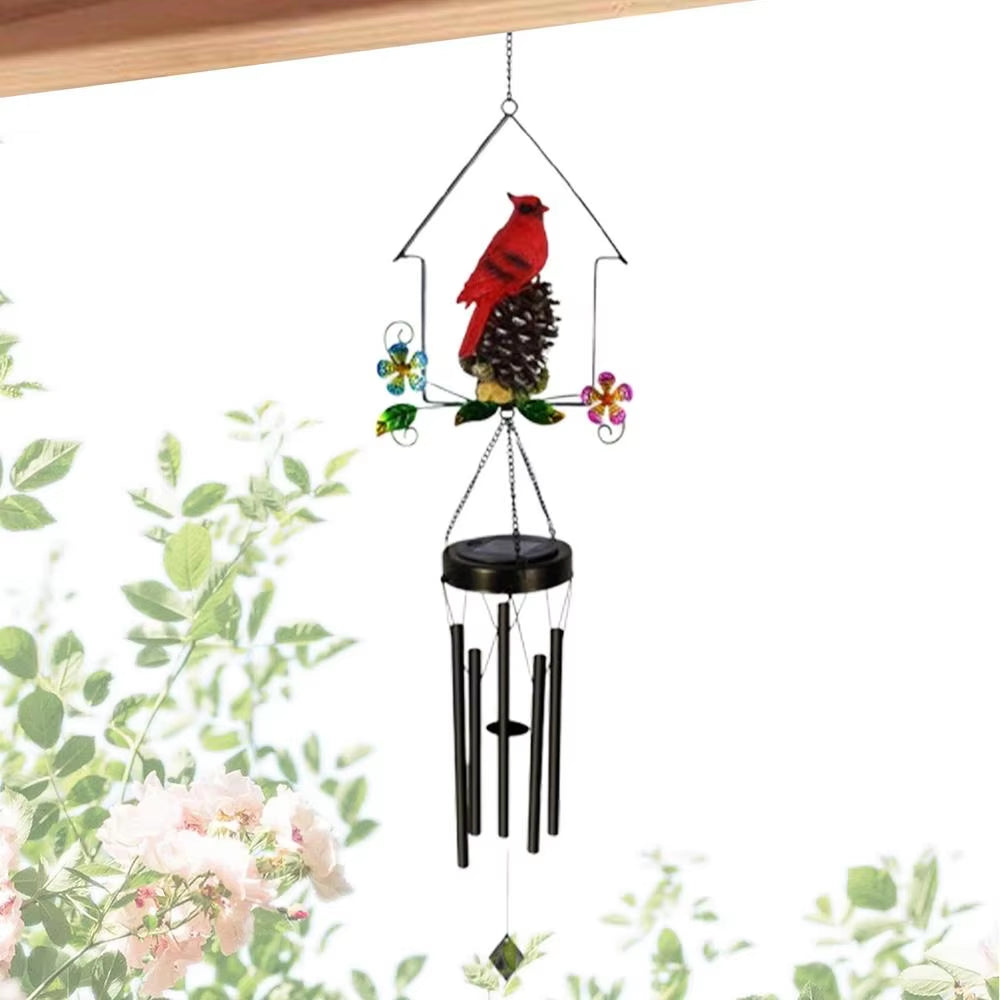 Solar wind chime featuring a red cardinal on a pinecone for garden decor