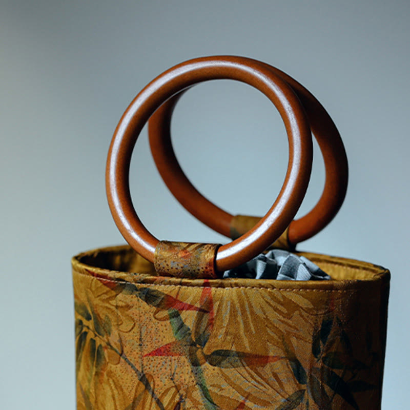 Spirituelle Handtasche mit Bambusblatt-Schmetterling und Holzgriff