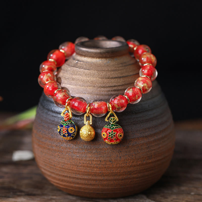 Spirituelles Armband mit goldenem Schlucktier und Liuli-Perlen