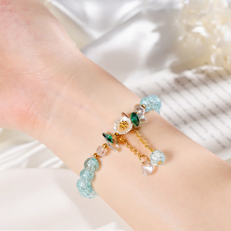 Spirituelles Glasperlenarmband mit Blumenanhänger zum Schutz