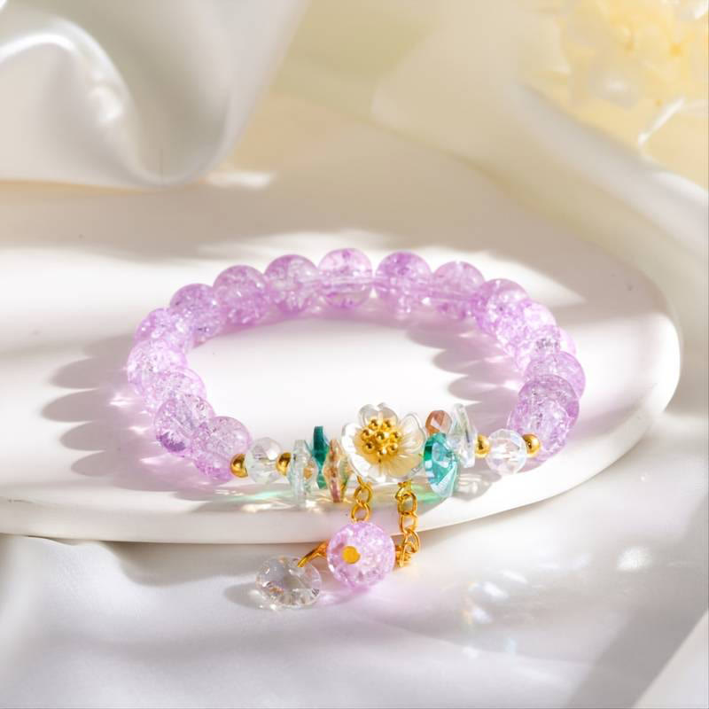 Spirituelles Glasperlenarmband mit Blumenanhänger zum Schutz