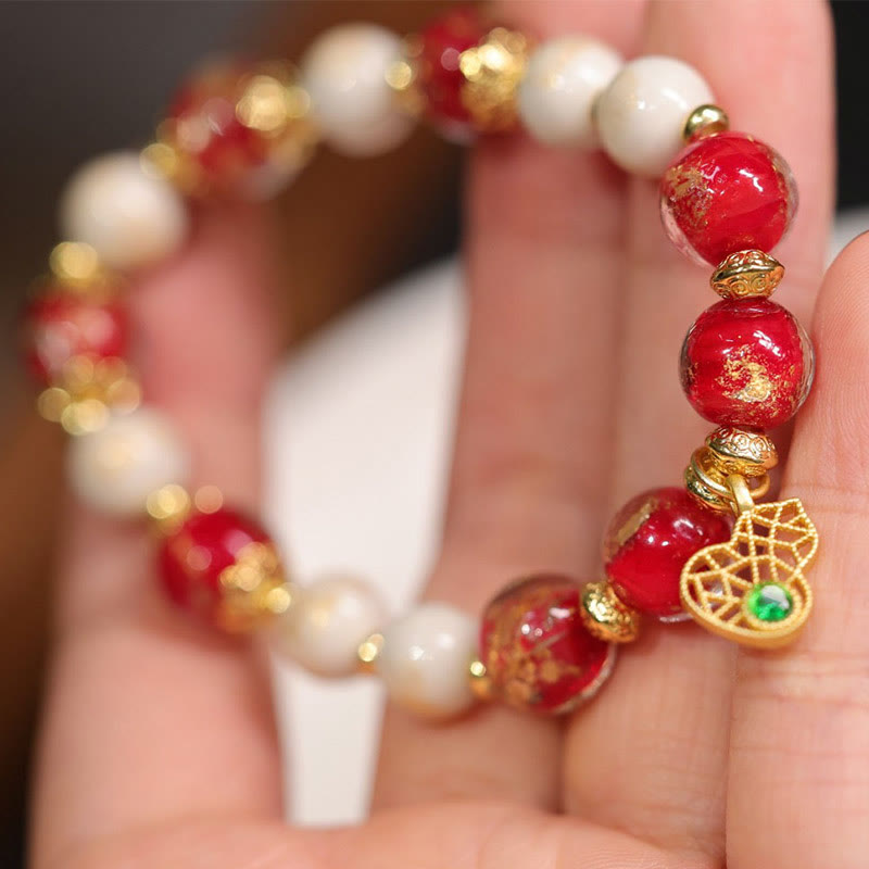 Spirituelles Kürbis-Armband „Gott des Reichtums“ mit Liuli-Glasperlen