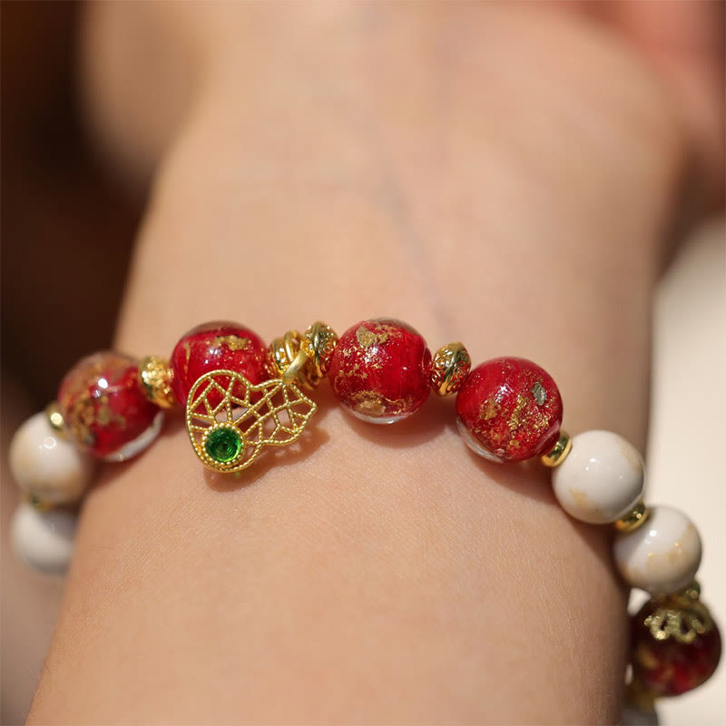 Spirituelles Kürbis-Armband „Gott des Reichtums“ mit Liuli-Glasperlen