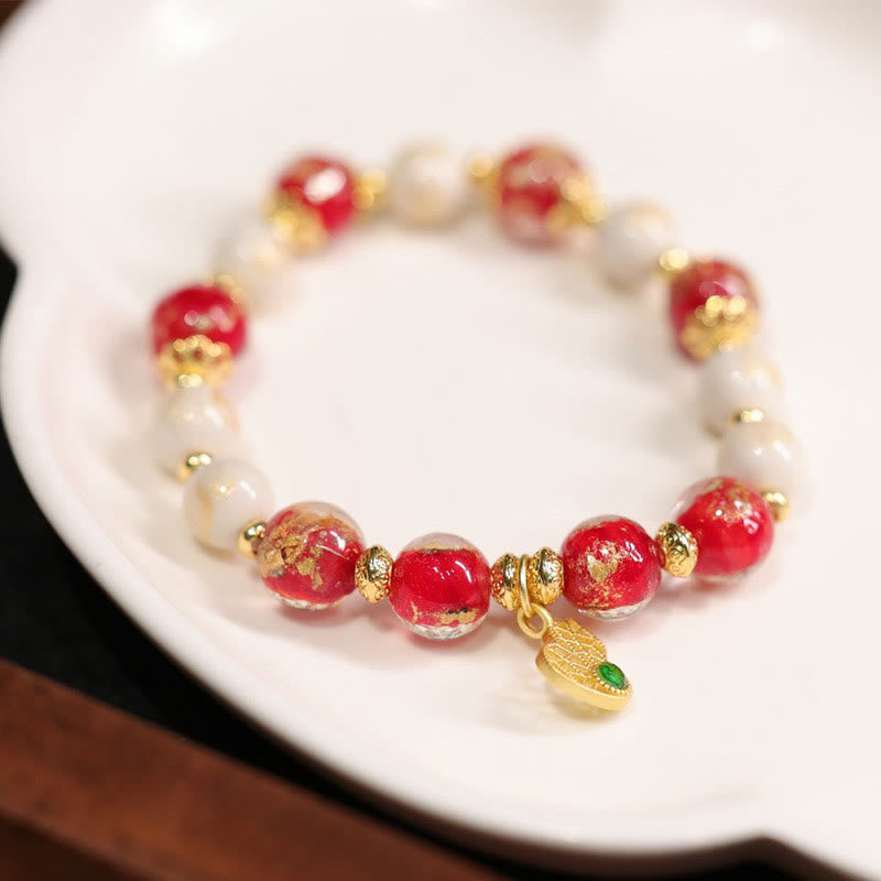 Spirituelles Kürbis-Armband „Gott des Reichtums“ mit Liuli-Glasperlen