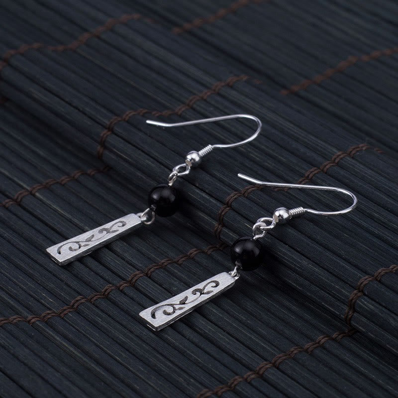Schutzohrringe aus Sterlingsilber mit schwarzem Onyx