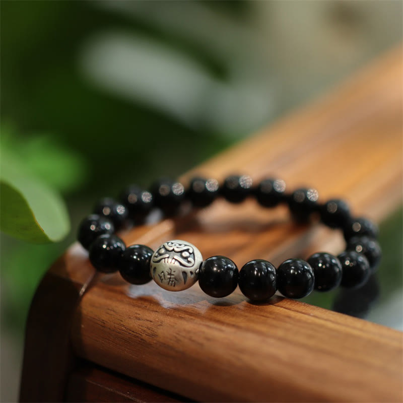 Spirituelles Schutzarmband aus Sterlingsilber mit schwarzem Onyx