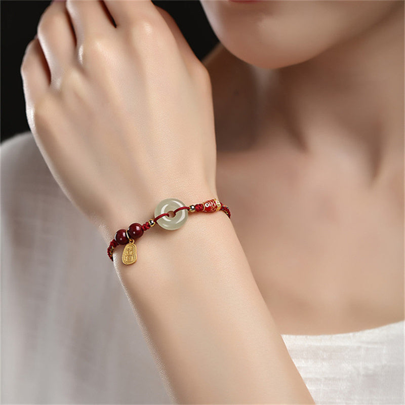 Armband aus Sterlingsilber mit Koi-Fisch und Jade-Peace-Schnalle