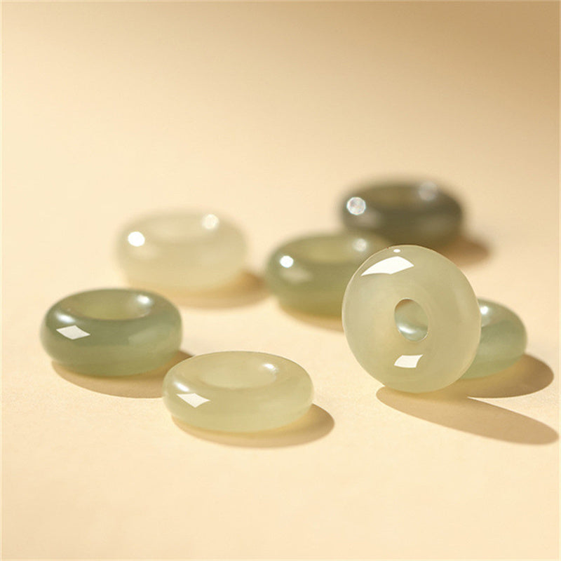 Armband aus Sterlingsilber mit Koi-Fisch und Jade-Peace-Schnalle