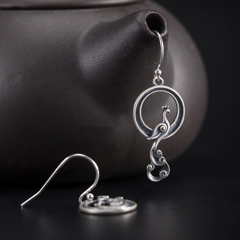Spirituelle Ohrringe aus Sterlingsilber mit Pfauenmotiv