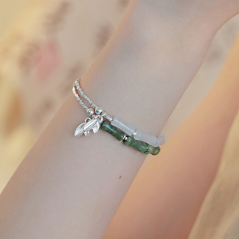 Spirituelles Armband aus Sterlingsilber mit Peridot und Bambus für Glück