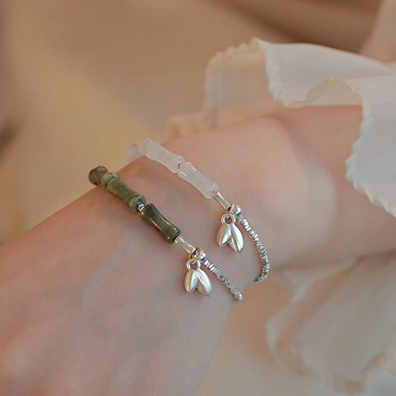 Spirituelles Armband aus Sterlingsilber mit Peridot und Bambus für Glück
