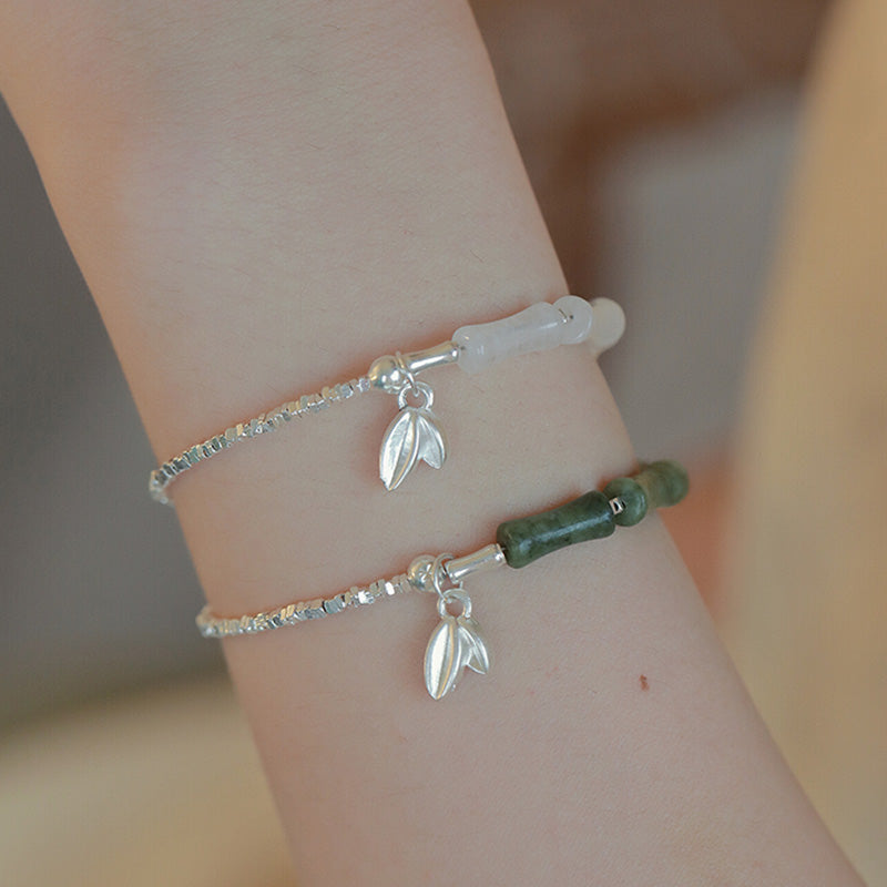 Spirituelles Armband aus Sterlingsilber mit Peridot und Bambus für Glück