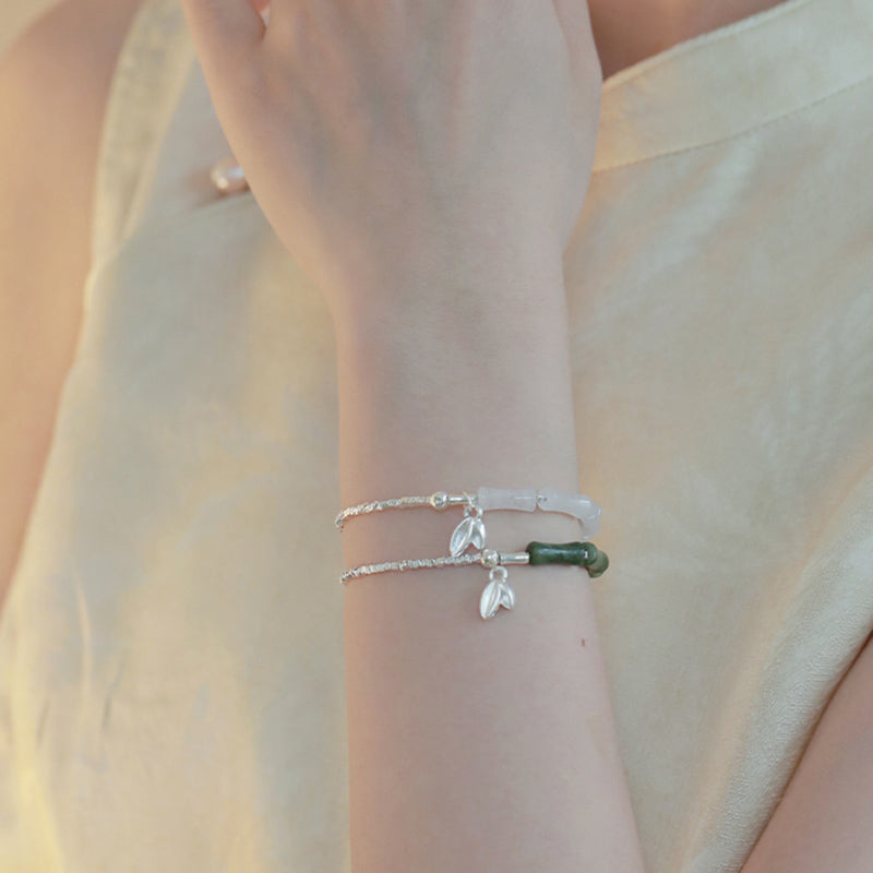 Spirituelles Armband aus Sterlingsilber mit Peridot und Bambus für Glück