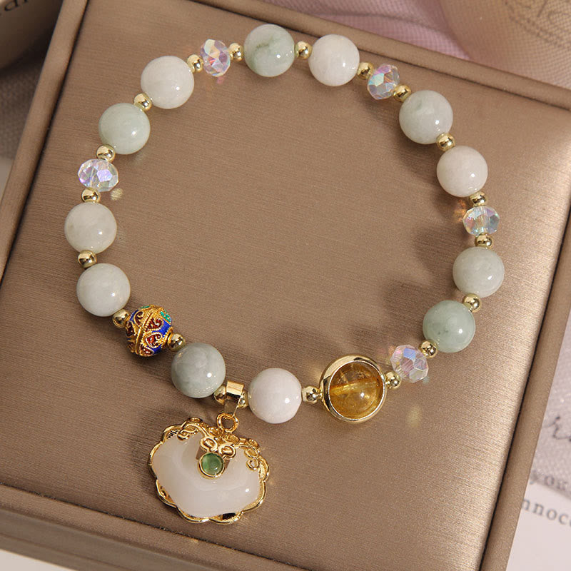 Heilarmband aus Erdbeerquarz mit chinesischem Schlossanhänger
