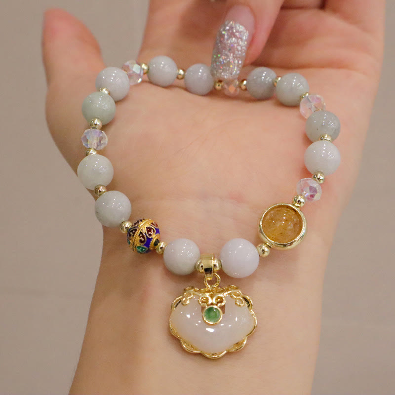 Heilarmband aus Erdbeerquarz mit chinesischem Schlossanhänger