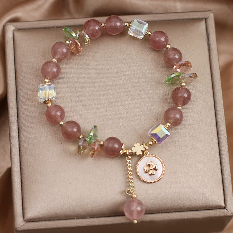 Spirituelles Armband mit Erdbeerquarz und vierblättrigem Kleeblatt