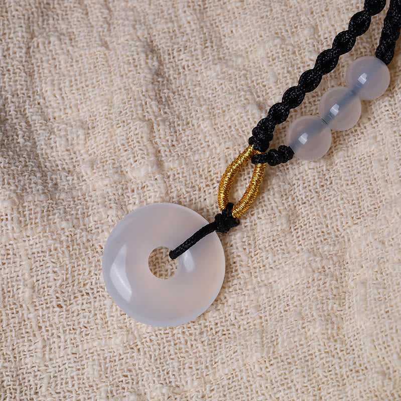 Heilende Halskette mit Erdbeerquarz-Friedensschnalle, 45 cm