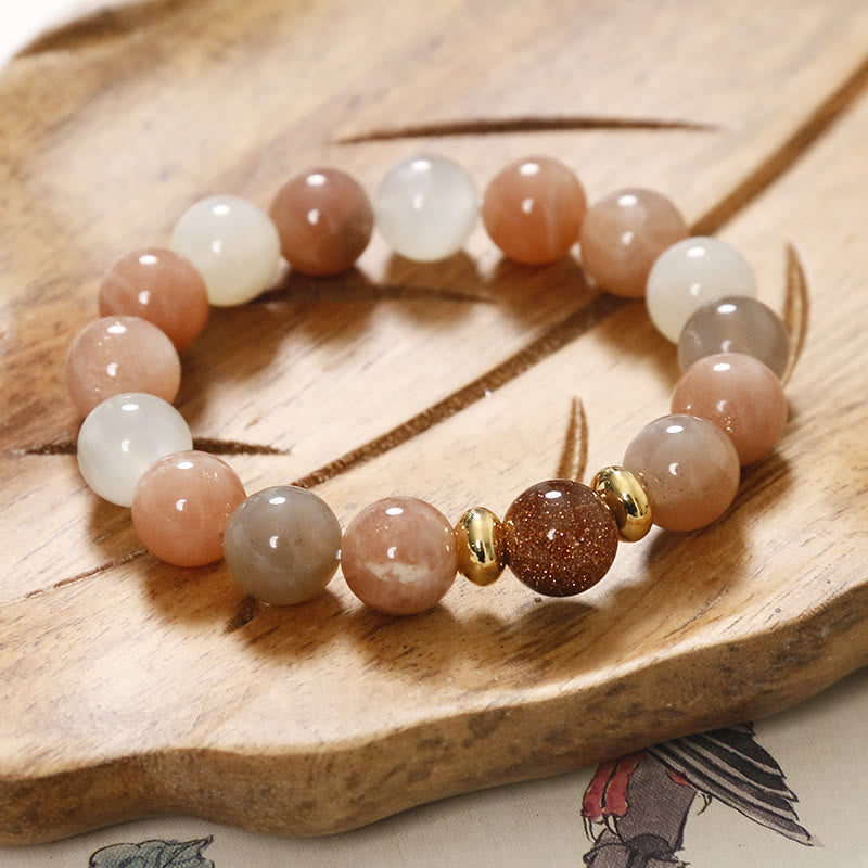 Spirituelles Armband aus Sonnenstein und Goldsandstein für Reichtum