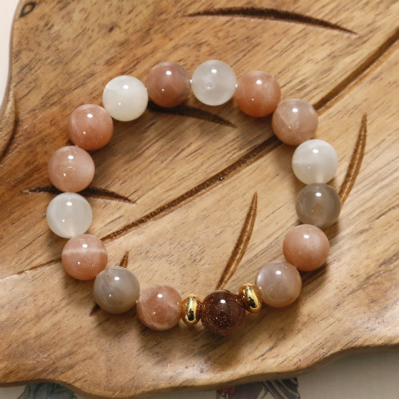 Spirituelles Armband aus Sonnenstein und Goldsandstein für Reichtum