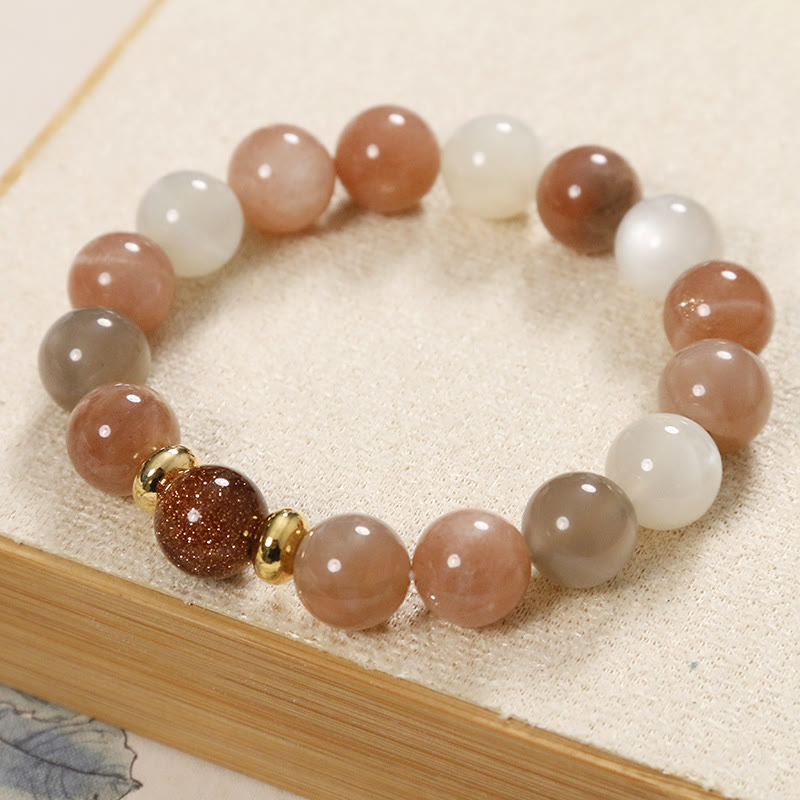 Spirituelles Armband aus Sonnenstein und Goldsandstein für Reichtum