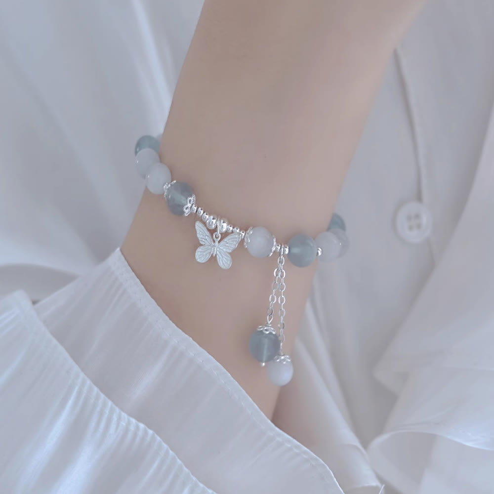 Unterstützen Sie das Aquamarin-Schmetterlings-Chakra-Armband mit heilenden Klängen