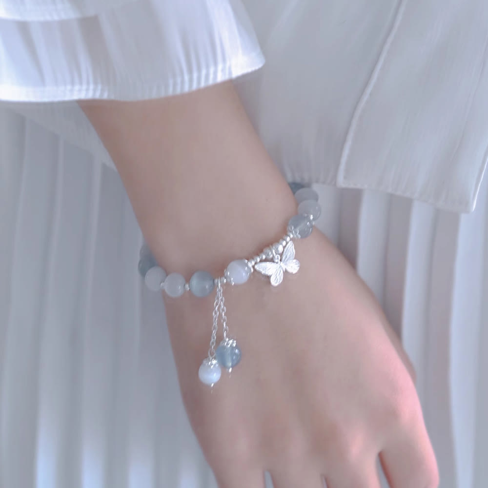 Unterstützen Sie das Aquamarin-Schmetterlings-Chakra-Armband mit heilenden Klängen