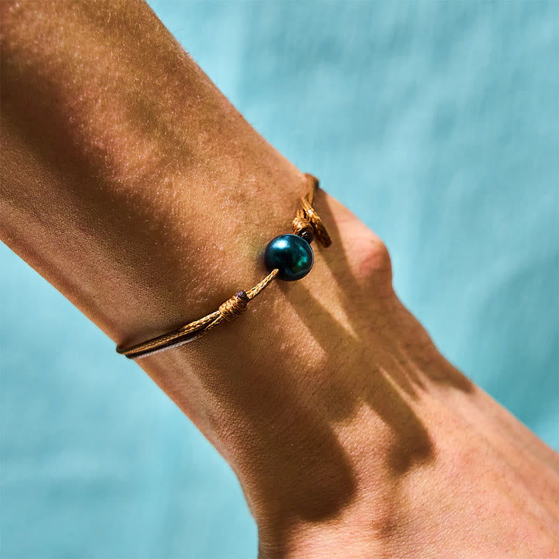 Heilarmband aus schwarzen Tahitiperlen an Wachsseil, 14–19 cm