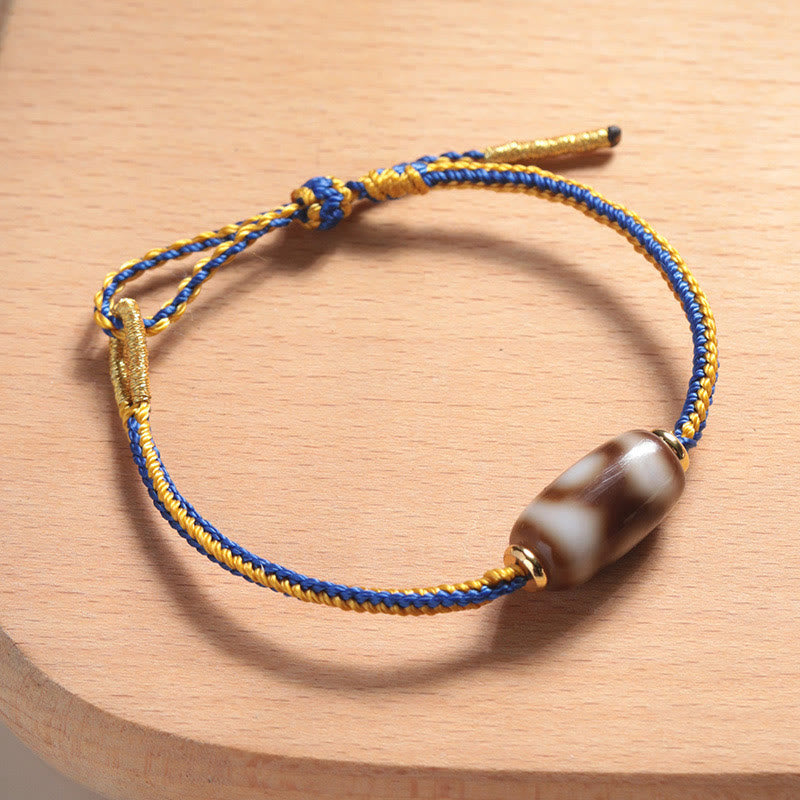 Spirituelles Armband mit dreiäugigen Dzi-Perlen für Glück und Freude