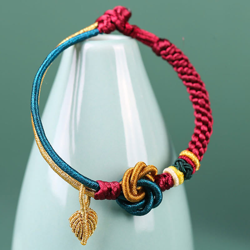 Tibetisches Mandala-Knoten-Glücksblatt-Armband mit roter Schnur