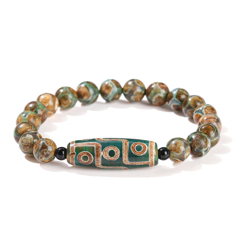 Tibetisches Neun-Augen-Dzi-Perlenarmband mit spirituellem Schutz