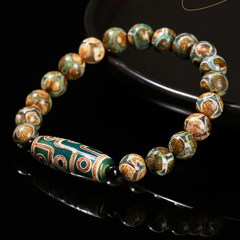 Tibetisches Neun-Augen-Dzi-Perlenarmband mit spirituellem Schutz