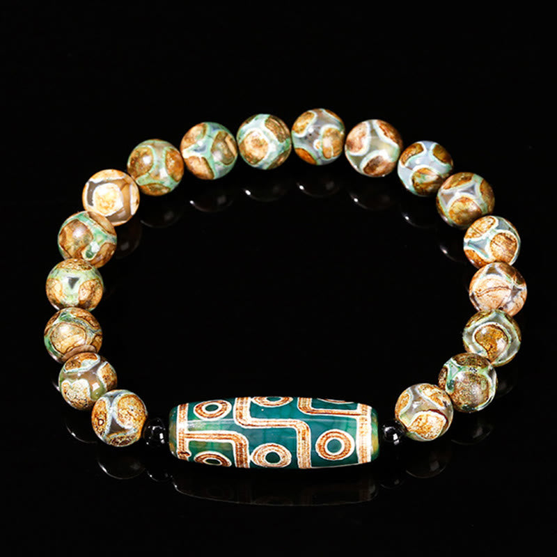 Tibetisches Neun-Augen-Dzi-Perlenarmband mit spirituellem Schutz