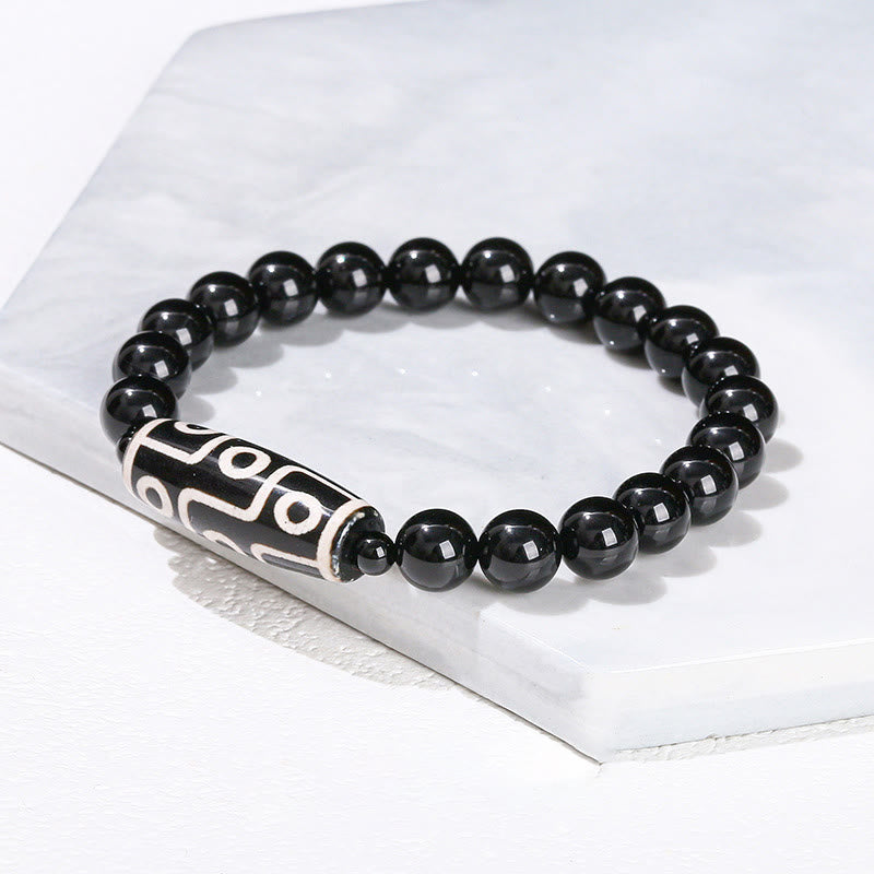 Tibetisches Neun-Augen-Dzi-Perlenarmband mit spirituellem Schutz