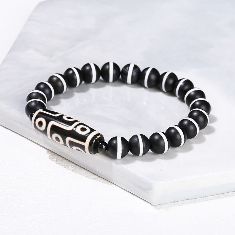 Tibetisches Neun-Augen-Dzi-Perlenarmband mit spirituellem Schutz