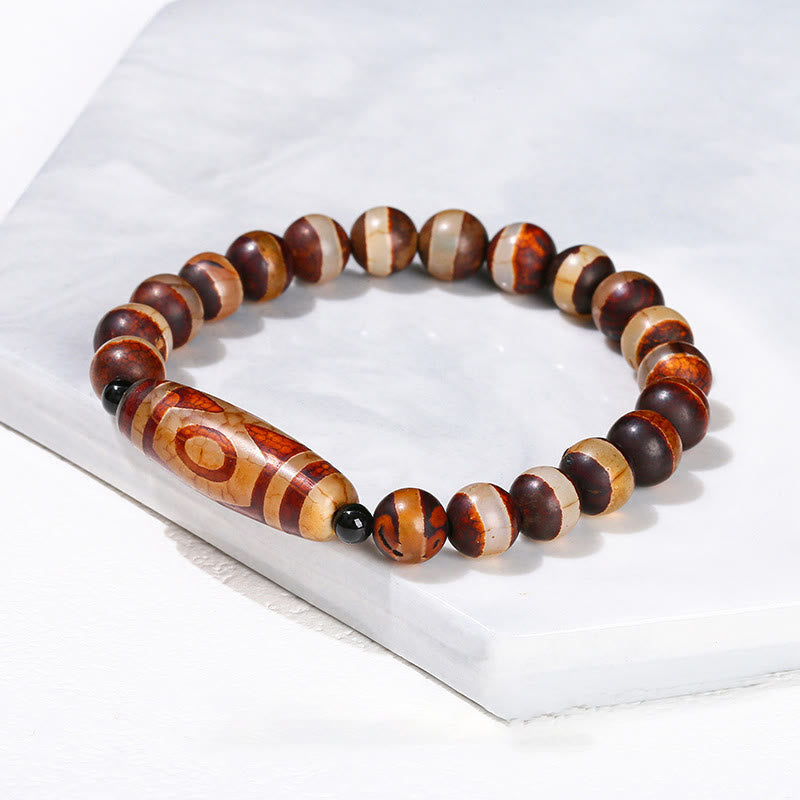 Tibetisches Neun-Augen-Dzi-Perlenarmband mit spirituellem Schutz