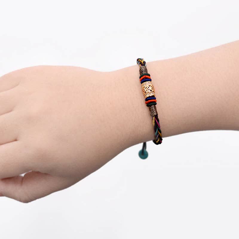 Tibetisches rotes Schnurarmband mit Kupfermünze | Schutz &amp; Glück