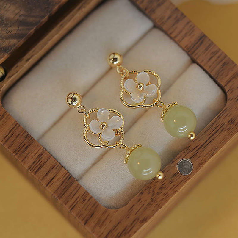 Tropfenohrringe aus Tridacna-Stein-Jade für Wohlstand und Ruhe