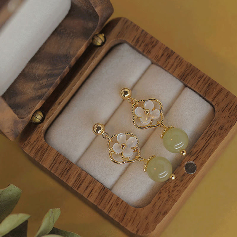 Tropfenohrringe aus Tridacna-Stein-Jade für Wohlstand und Ruhe