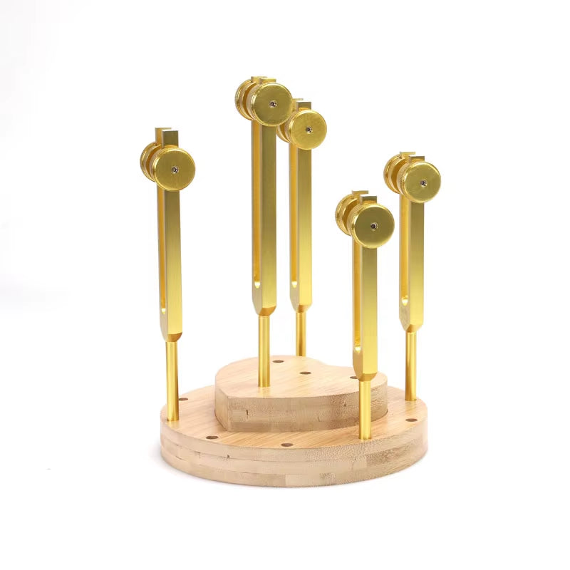 Wooden base with brass tuning forks in a circular arrangement for Tuning Fork Stand Holder