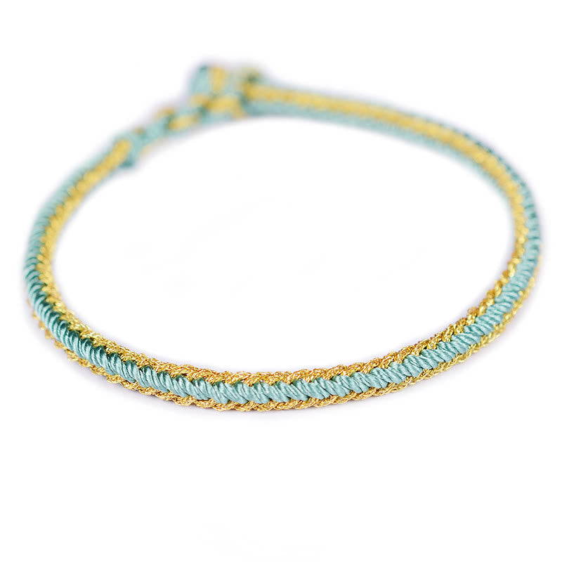 Zweifarbiges, handgefertigtes Armband mit acht Fäden und rotem Peace-Knoten