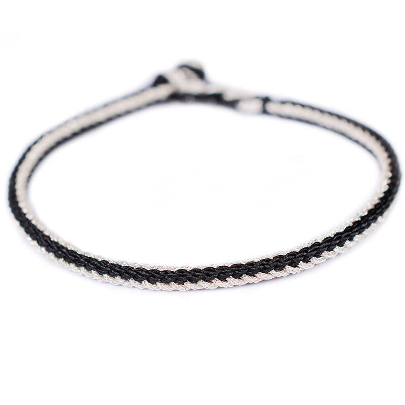 Zweifarbiges, handgefertigtes Armband mit acht Fäden und rotem Peace-Knoten
