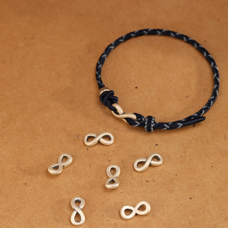 Unisex-Armband aus roter Schnur, 14–18 cm, mit Unendlichkeitsknoten aus Sterlingsilber